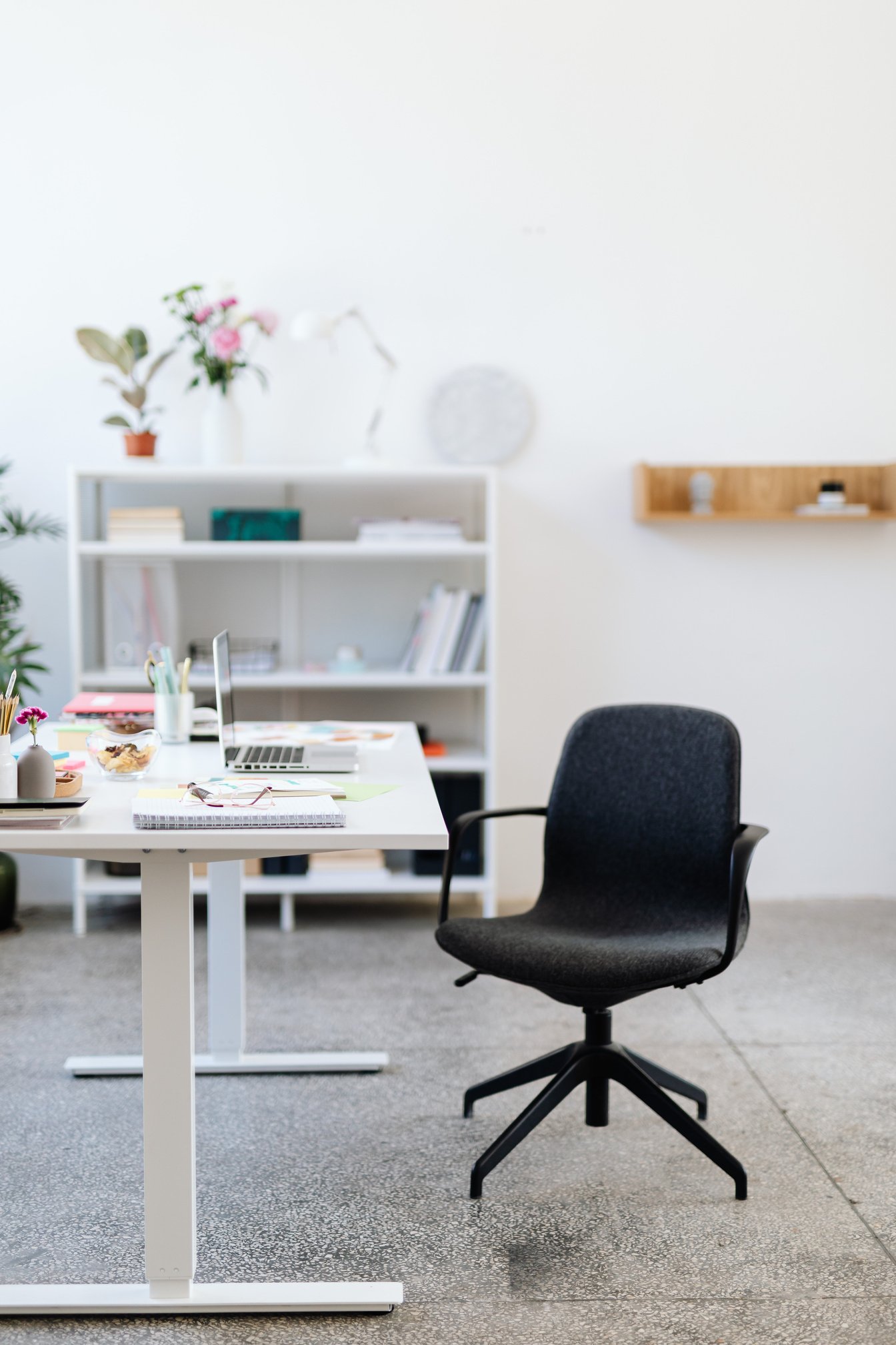 An Office Chair Beside a Work Desk